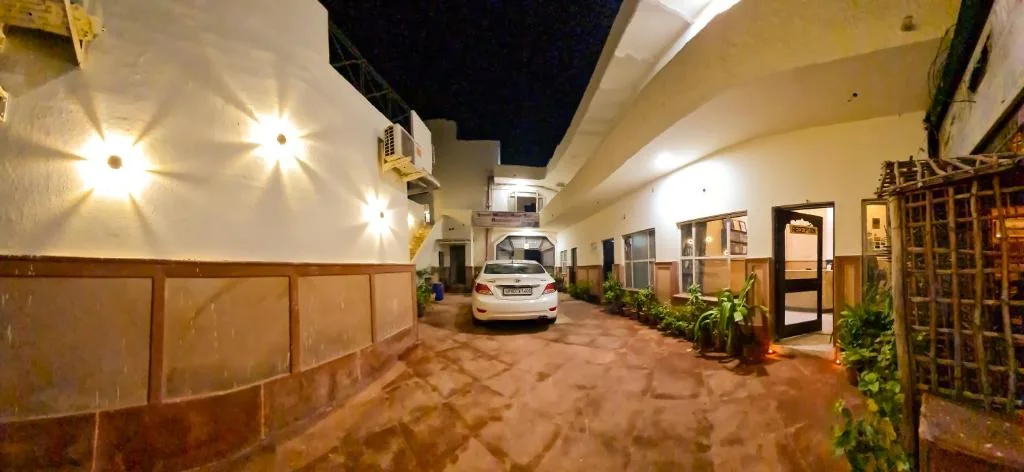 The entrance to Hotel Kamal with parking at the door